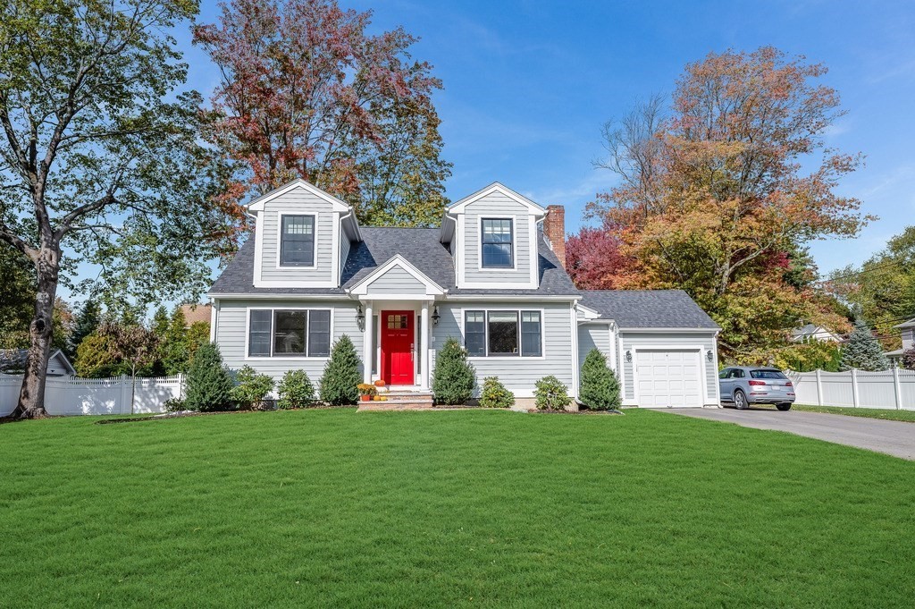 3 Garrison Road Wellesley, MA 02482 - Photo 33 of 36 a front view of house with yard and green space