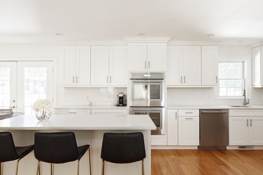 3 Garrison Road Wellesley, MA 02482 - Photo 4 of 36 a kitchen with a sink cabinets and window