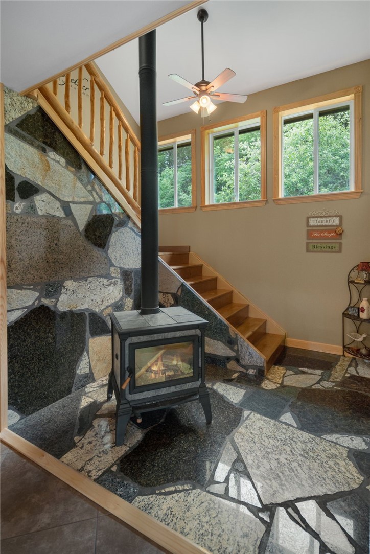 5903 Howell Road Locke, NY 13092 - Photo 9 of 44 A high-efficiency wood stove keeps you cozy year-round