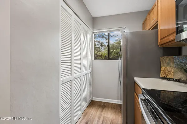 a view of kitchen and utility room