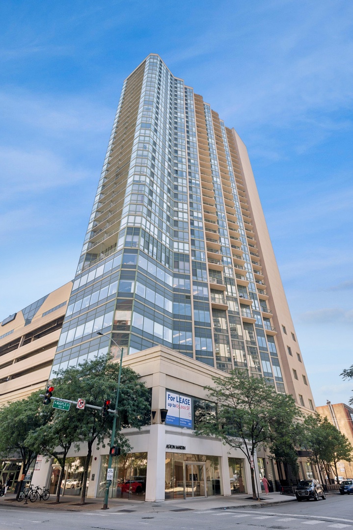 111 West Maple Street, Unit 1704 Chicago, IL 60610 - Photo 1 of 24 a front view of a building
