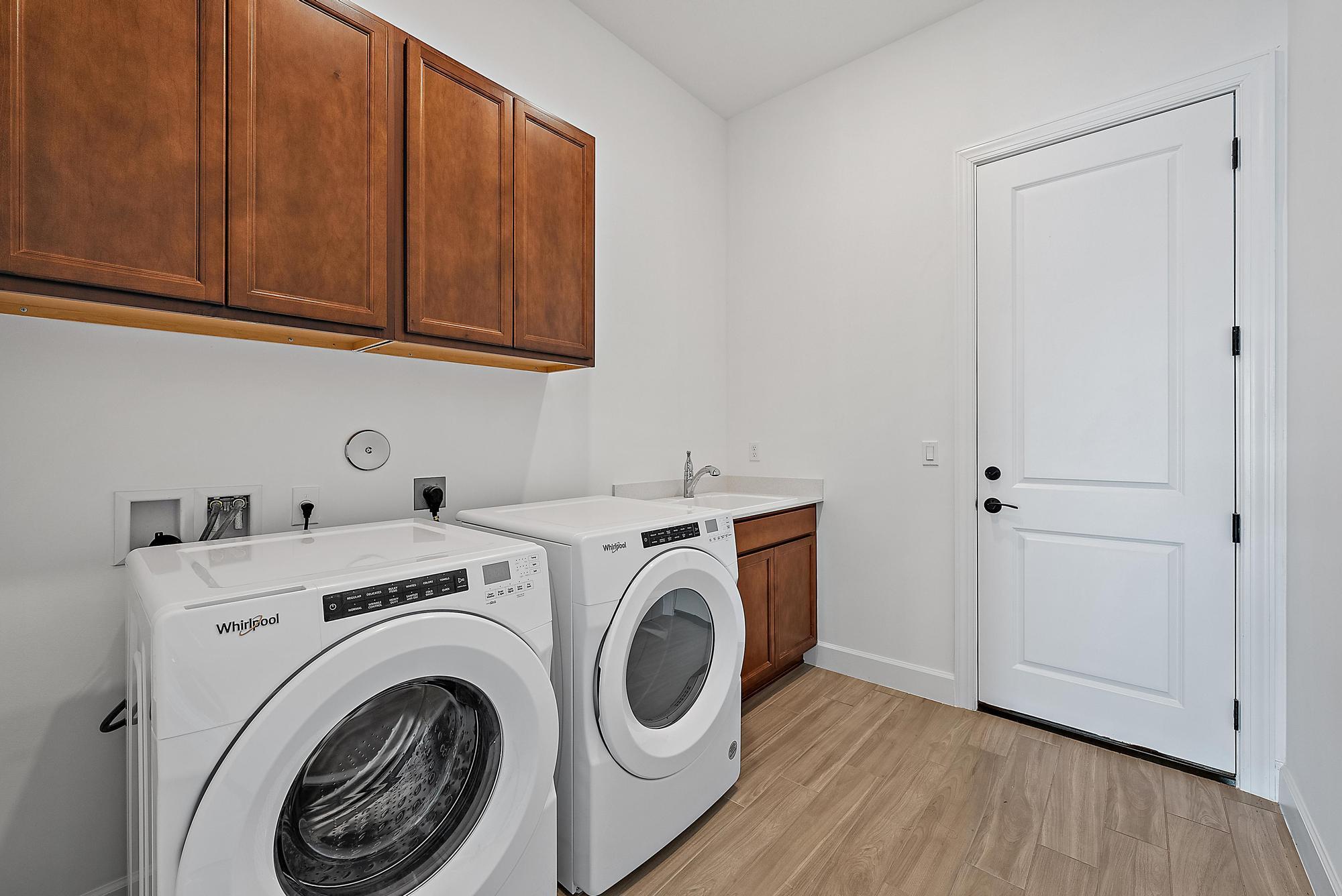 9801 Southwest Legacy Drive Stuart, FL 34997 - Photo 24 of 46 LAUNDRY ROOM