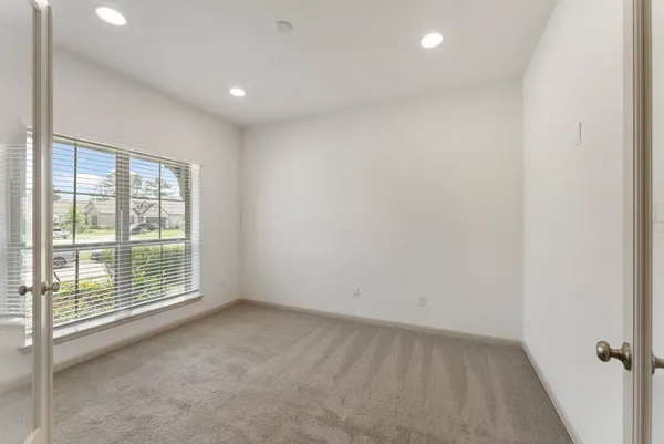 an empty room with windows