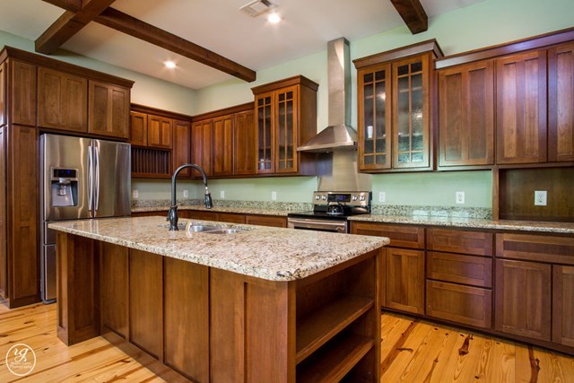 1139 Hill Road Forsyth, GA 31029 - Photo 3 of 23 a kitchen with a sink stove and cabinets