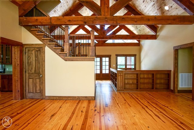 1139 Hill Road Forsyth, GA 31029 - Photo 8 of 23 a bedroom with a bed and wooden floor