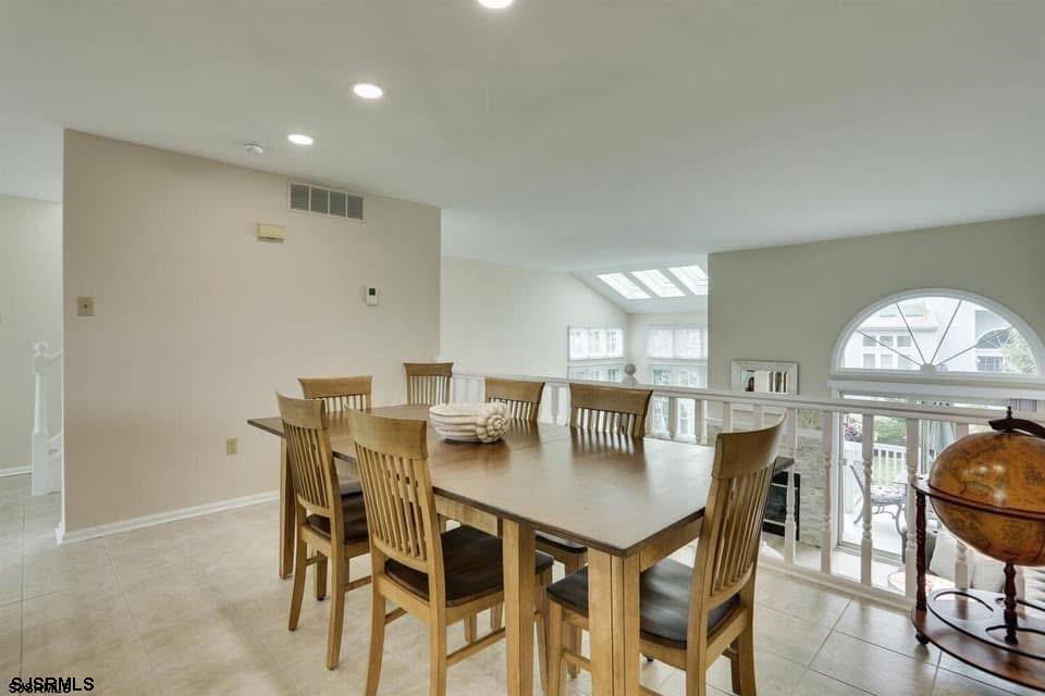 433 Albacore Lane Brigantine, NJ 08203 - Photo 12 of 22 a view of a dining room with furniture