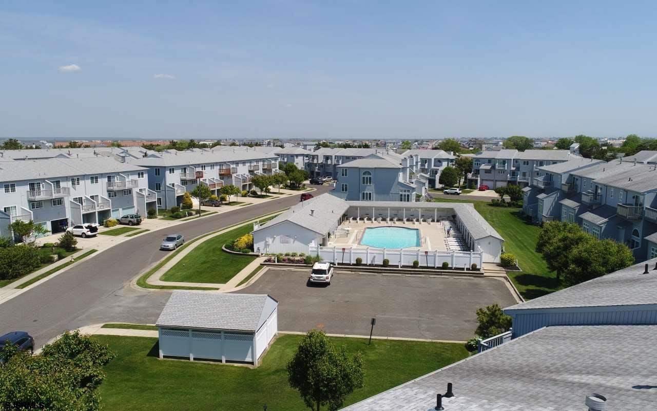 433 Albacore Lane Brigantine, NJ 08203 - Photo 22 of 22 an aerial view of a house with outdoor space