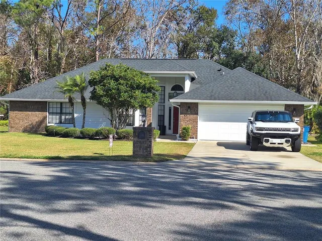 a view of a house with a swimming pool