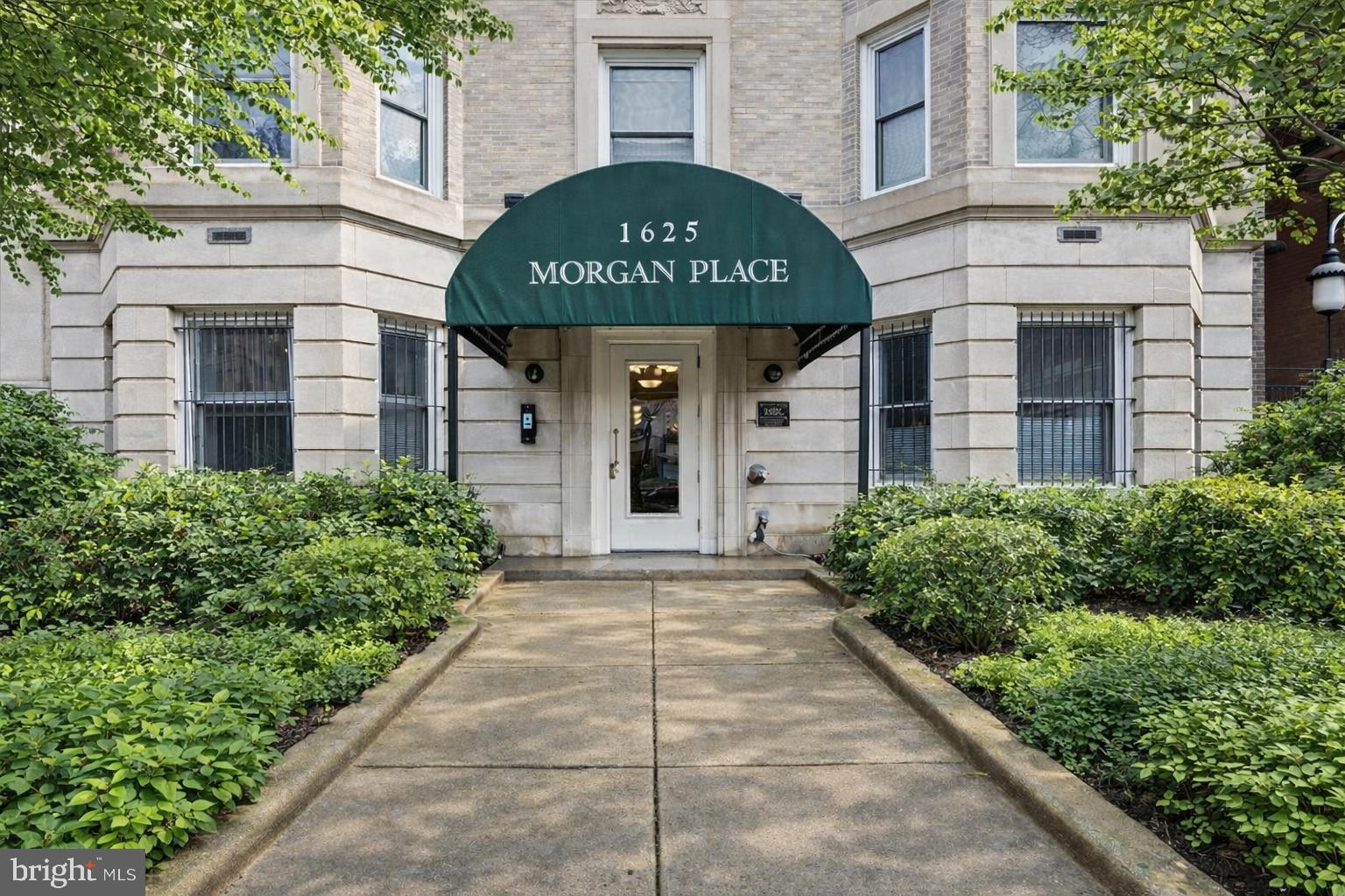 1625 16th Street Northwest, Unit 302 Washington, DC 20009 - Photo 1 of 26 a front view of a building with garden