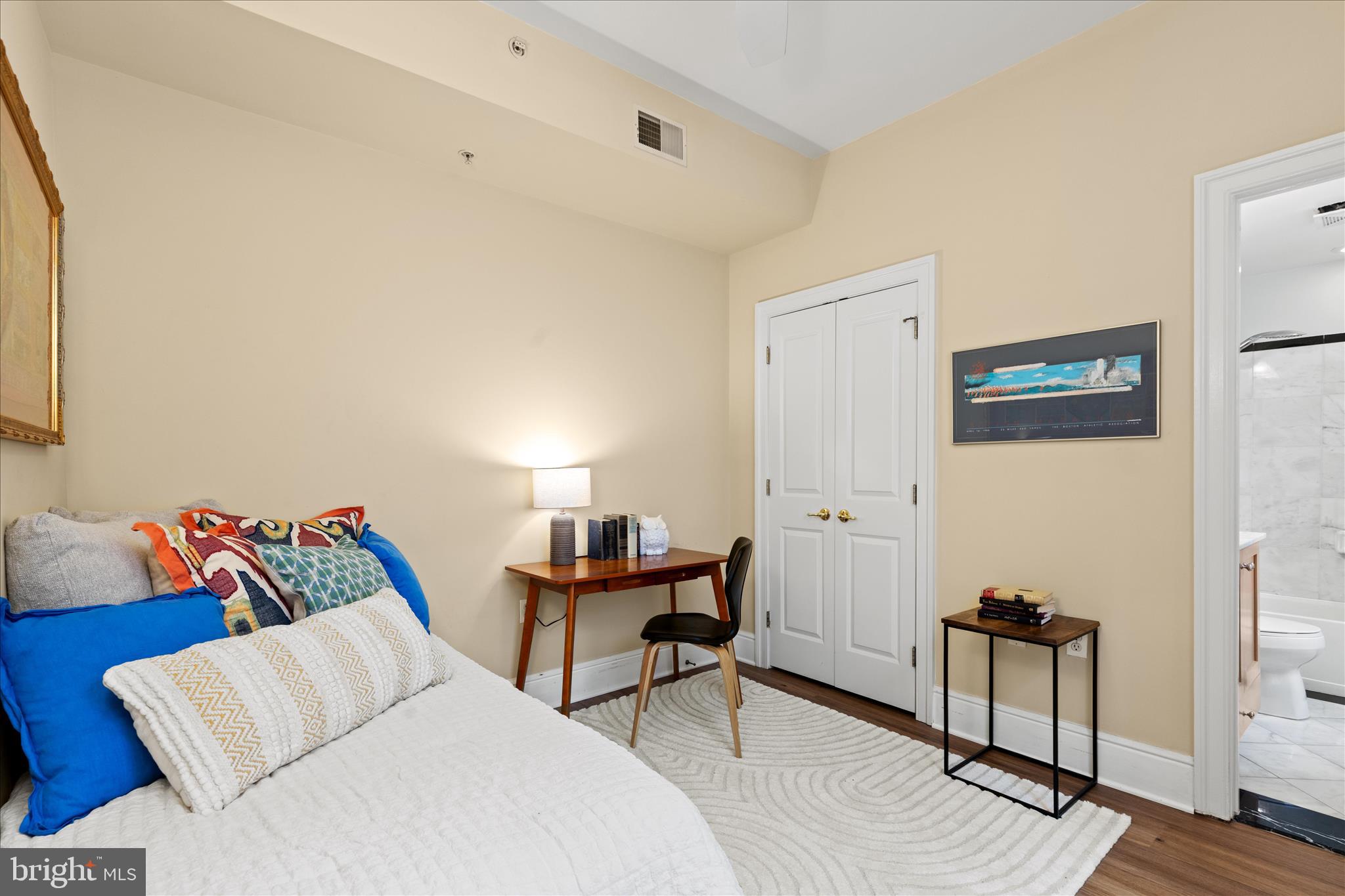 1625 16th Street Northwest, Unit 302 Washington, DC 20009 - Photo 18 of 26 a living room with furniture and a wooden floor