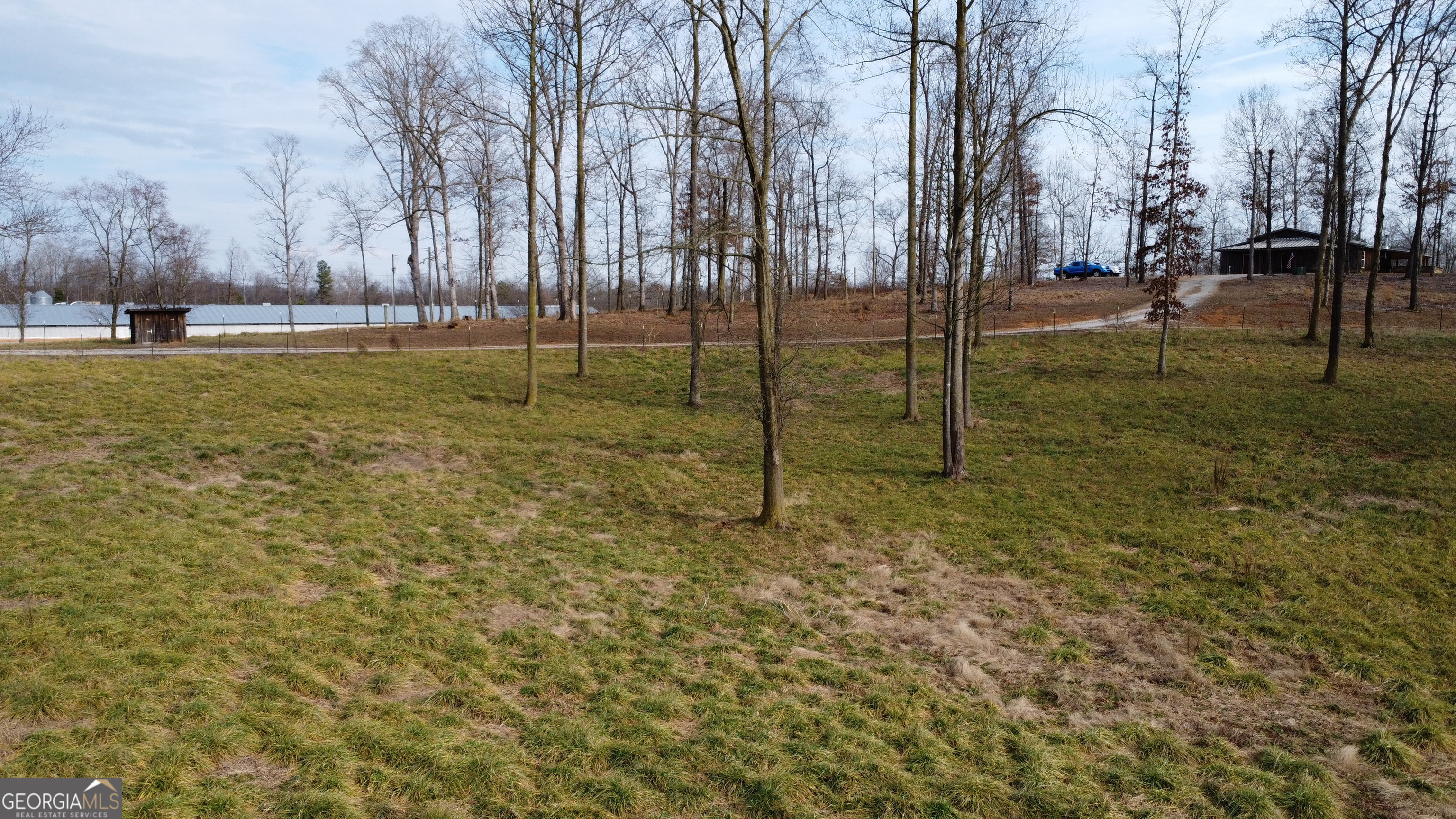 1.73-acres Tr3 Garrison Road Cornelia, GA 30531 - Photo 1 of 5 a view of a park with large trees