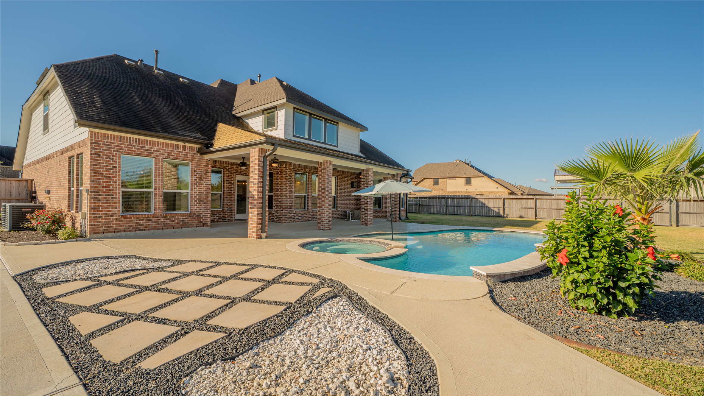 4603 Clearwater Road Baytown, TX 77523 - Photo 25 of 31 a front view of a house with garden