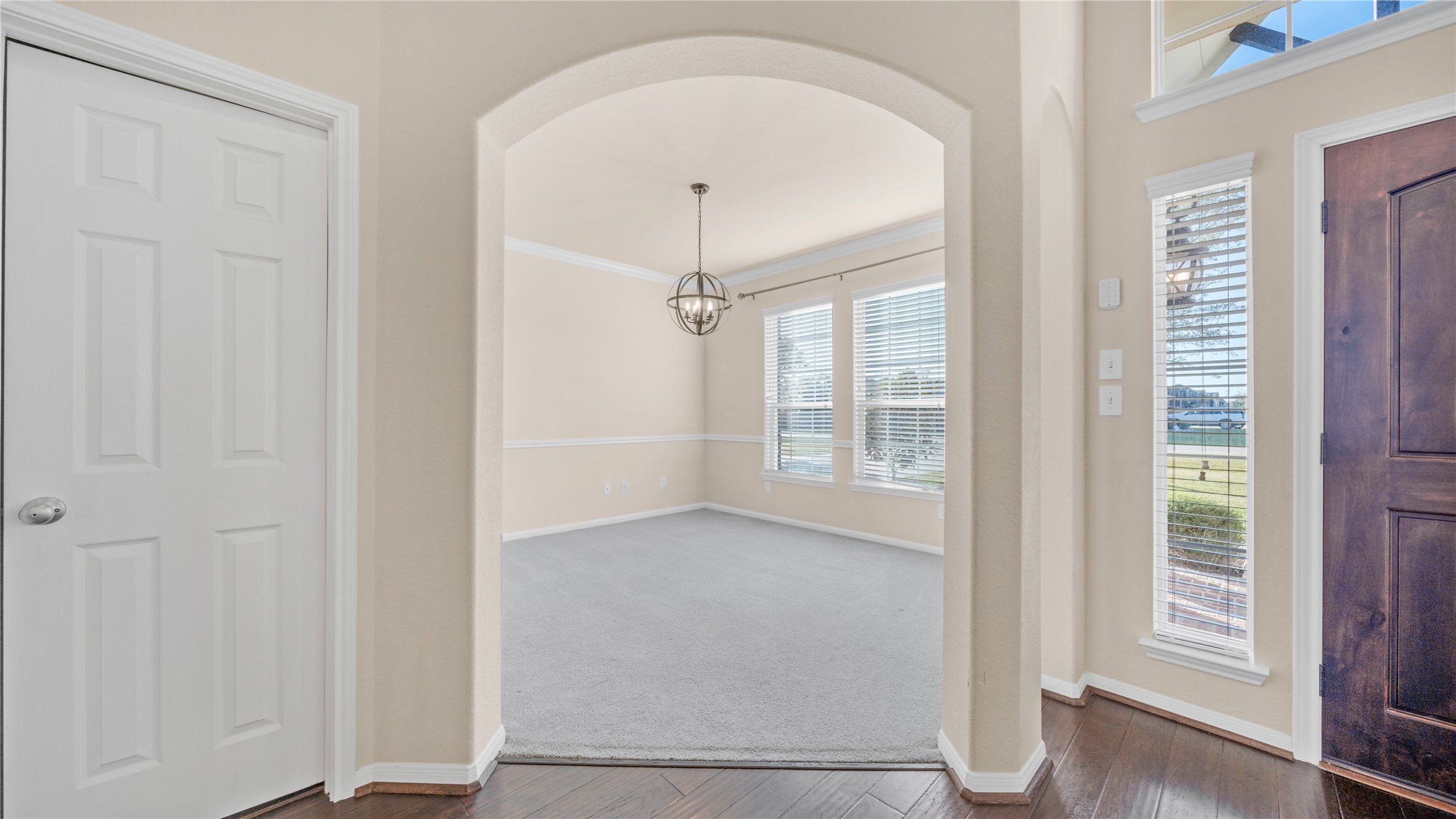 4603 Clearwater Road Baytown, TX 77523 - Photo 6 of 31 a view of empty room with wooden floor and fan