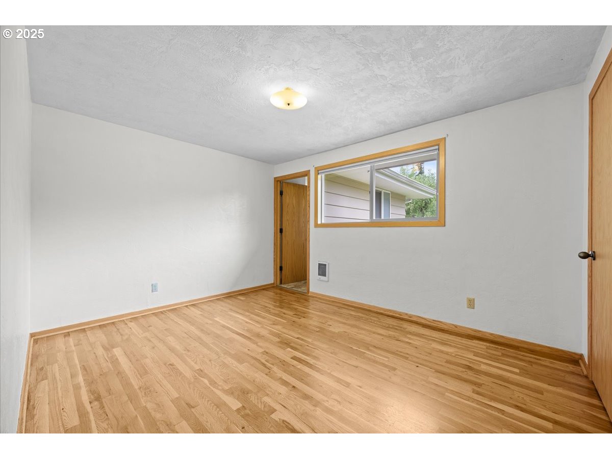 11623 Broadacres Road Northeast Hubbard, OR 97032 - Photo 19 of 48 a view of an empty room