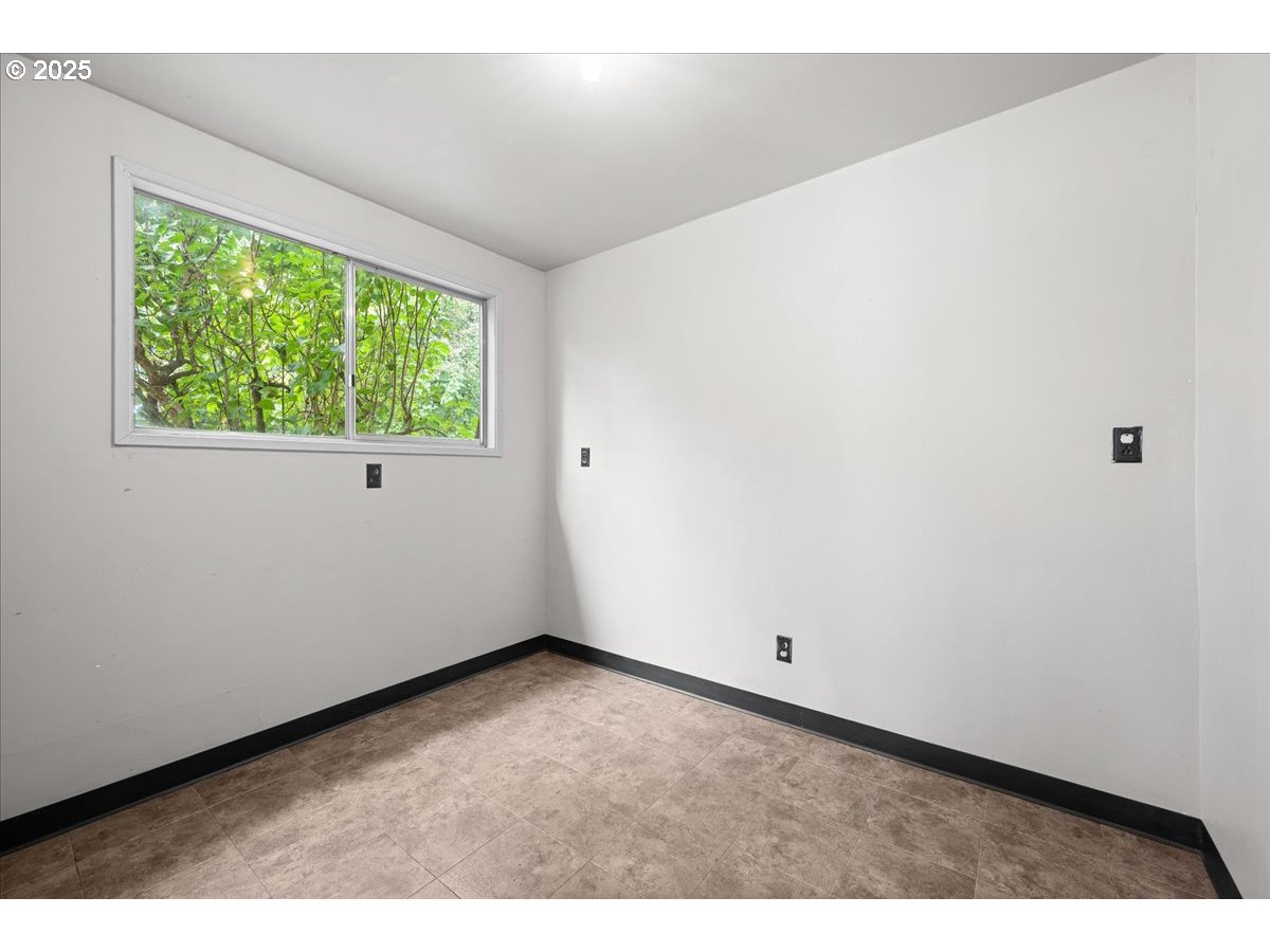 11623 Broadacres Road Northeast Hubbard, OR 97032 - Photo 33 of 48 a view of an empty room with a window