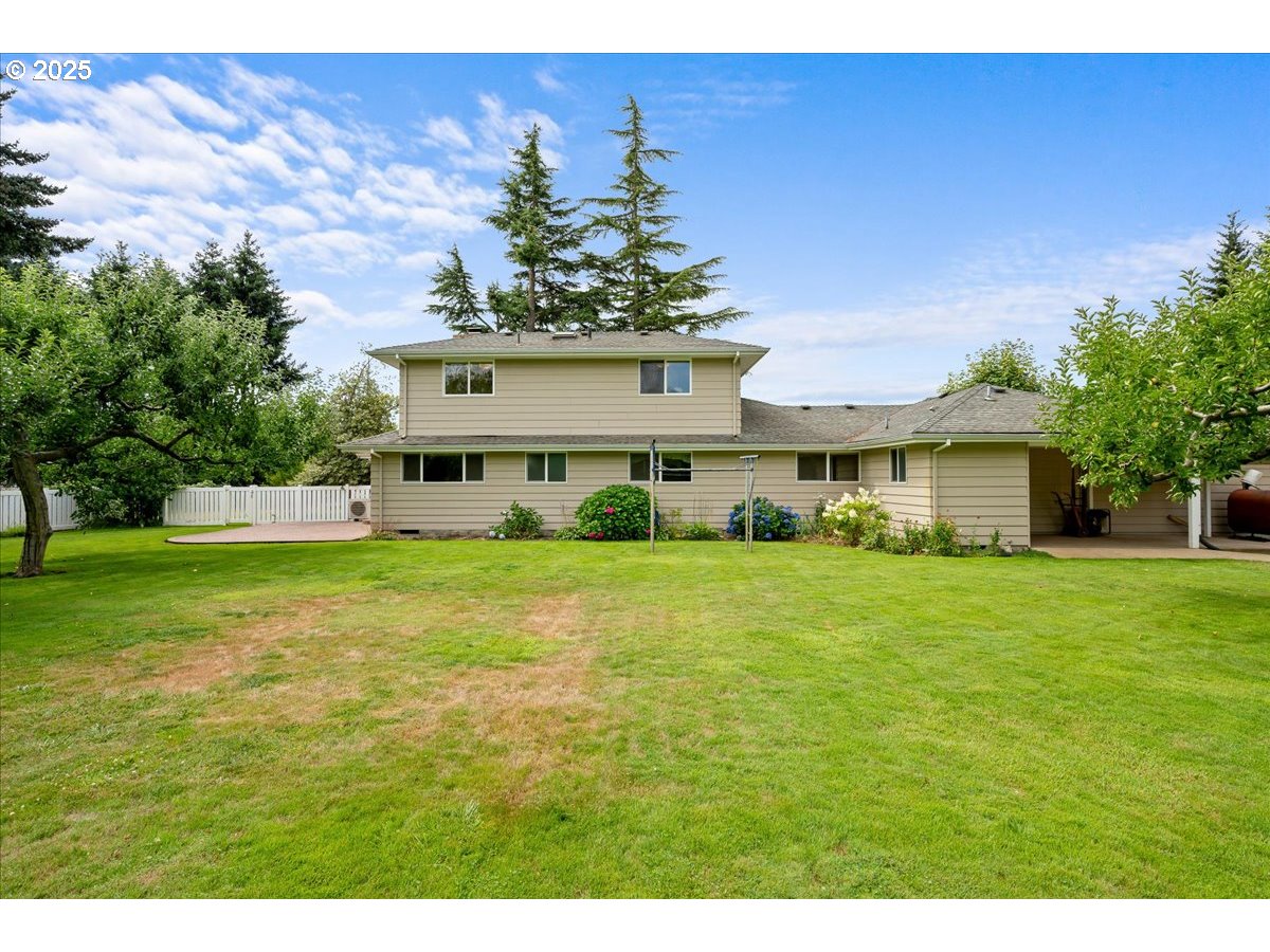 11623 Broadacres Road Northeast Hubbard, OR 97032 - Photo 46 of 48 a front view of a house with a yard