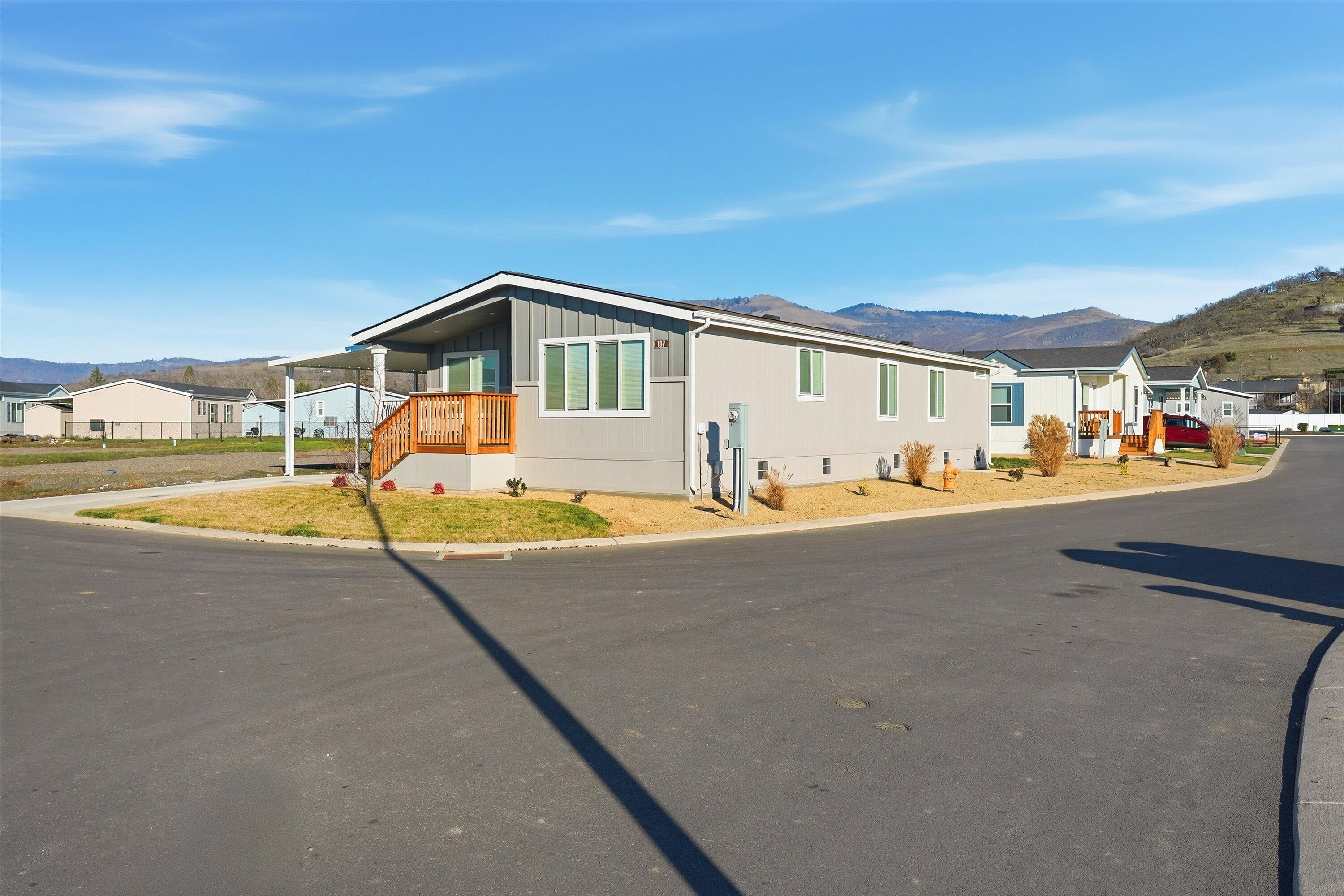 300 Luman Road, Unit 197 Phoenix, OR 97535 - Photo 24 of 26 a view of a house with swimming pool