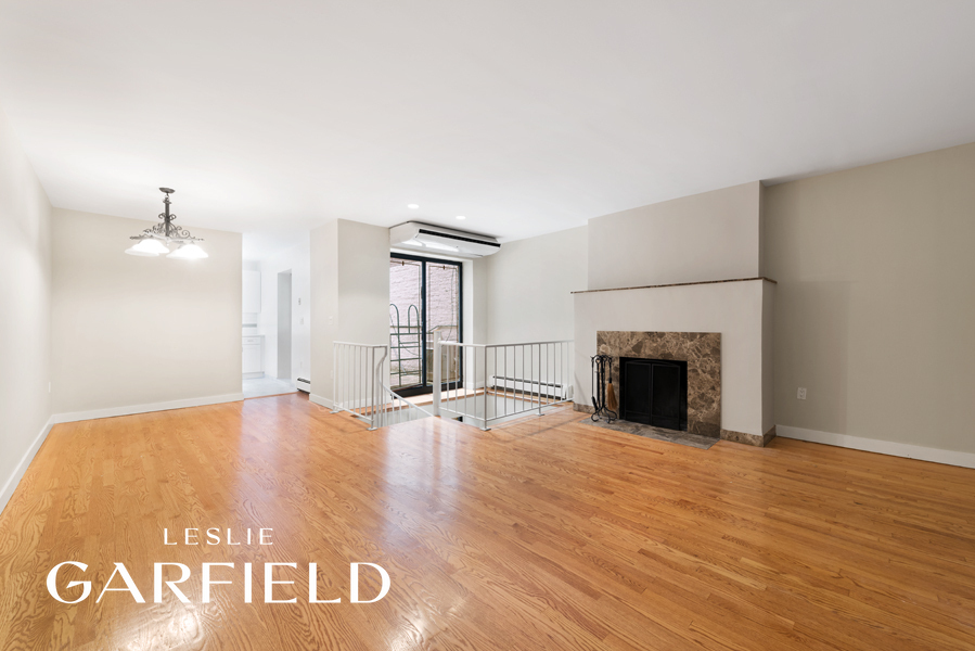 23 West 69th Street Manhattan, NY 10023 - Photo 6 of 10 a view of empty room with wooden floor