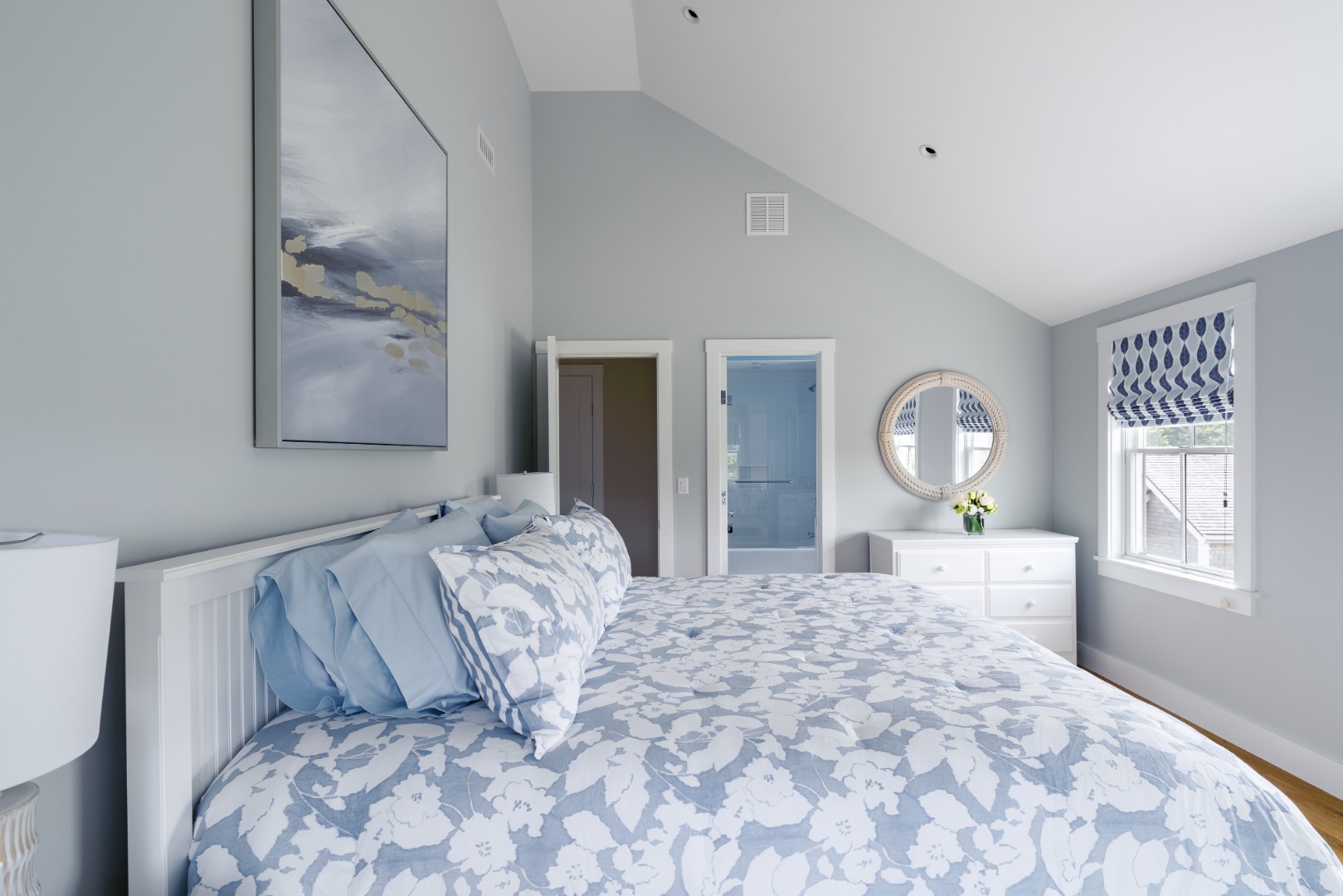 86 Cliff Road Nantucket, MA 02554 - Photo 10 of 29 a bedroom with a large bed and a window