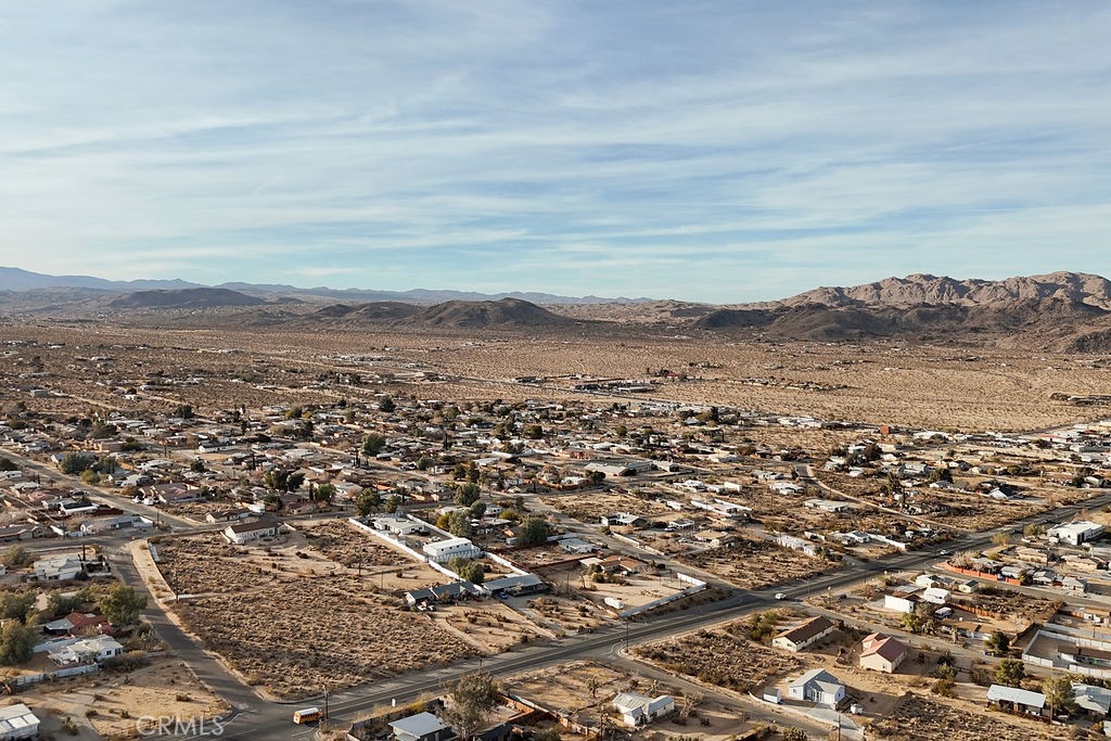 6981 Alturas Drive Joshua Tree, CA 92252 - Photo 14 of 27 an aerial view of residential houses with outdoor space