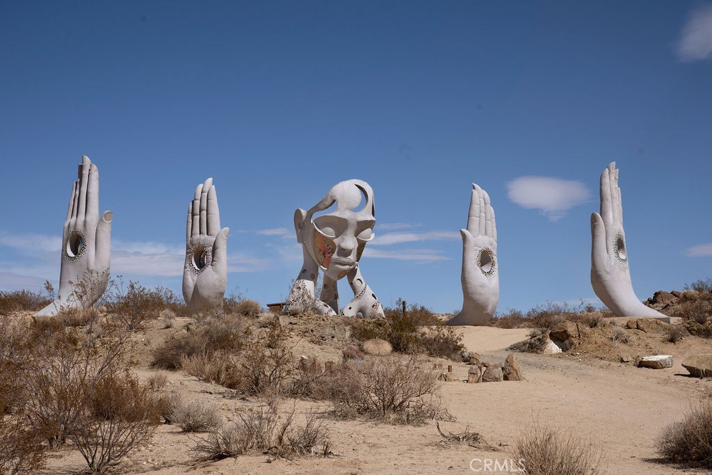 6981 Alturas Drive Joshua Tree, CA 92252 - Photo 24 of 27 a view of a fireplace in a room