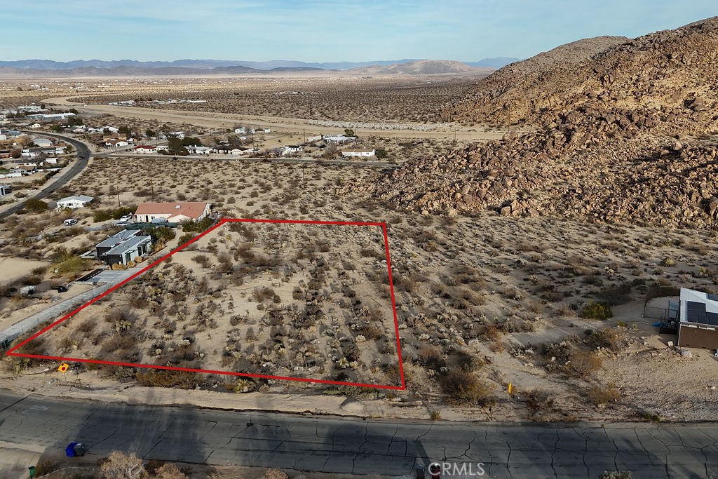 6981 Alturas Drive Joshua Tree, CA 92252 - Photo 4 of 27 an aerial view of residential houses with outdoor space