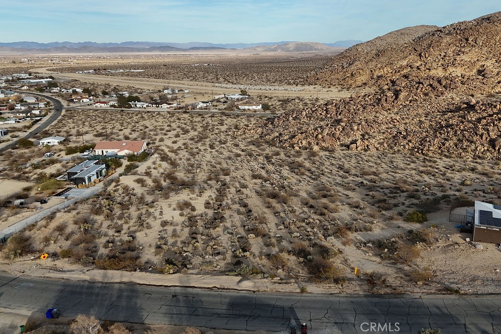6981 Alturas Drive Joshua Tree, CA 92252 - Photo 7 of 27 an aerial view of house with yard
