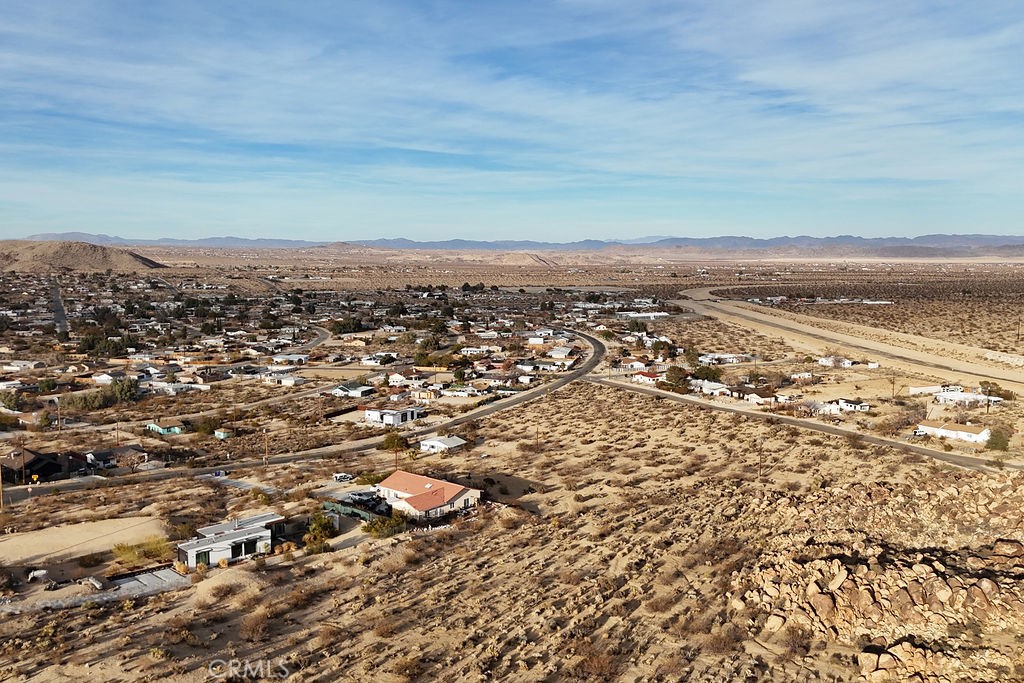 6981 Alturas Drive Joshua Tree, CA 92252 - Photo 8 of 27 an aerial view of residential building and ocean
