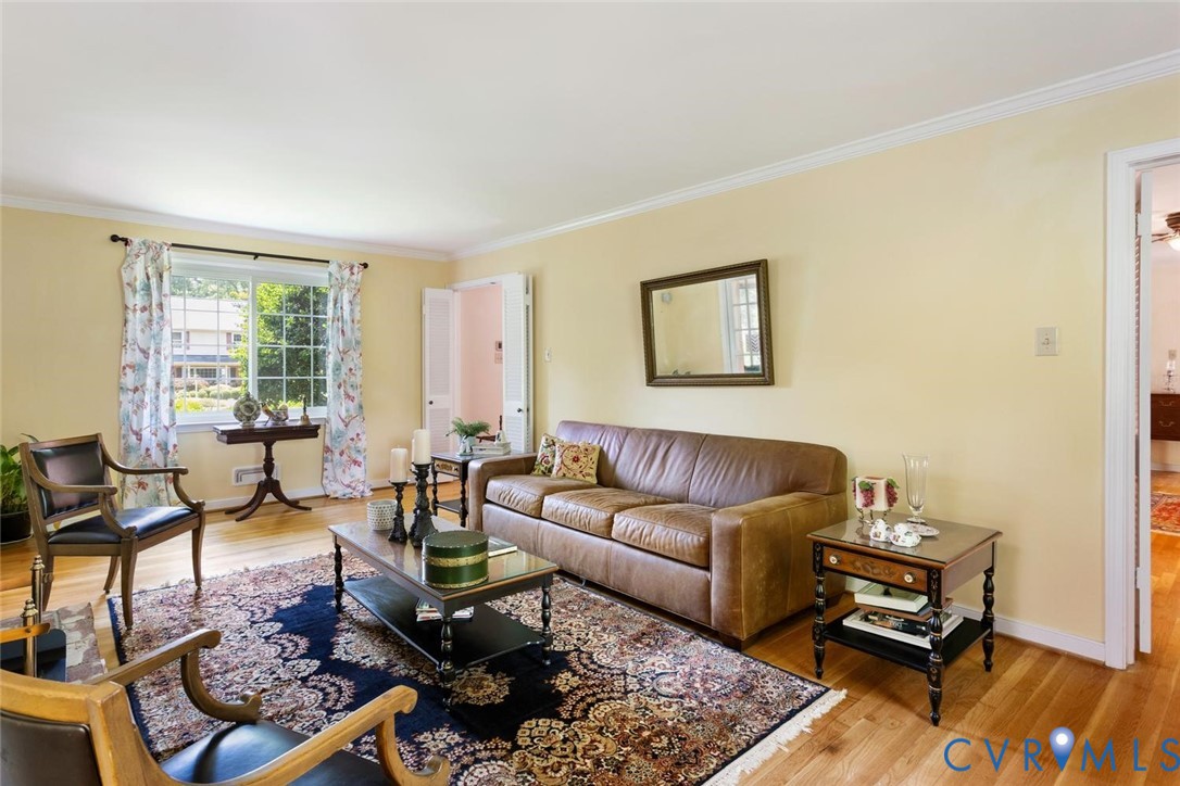 10260 Maplested Lane Henrico, VA 23229 - Photo 10 of 38 Living room featuring wood-finish flooring, a larg