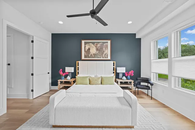 a bedroom with bed and furniture