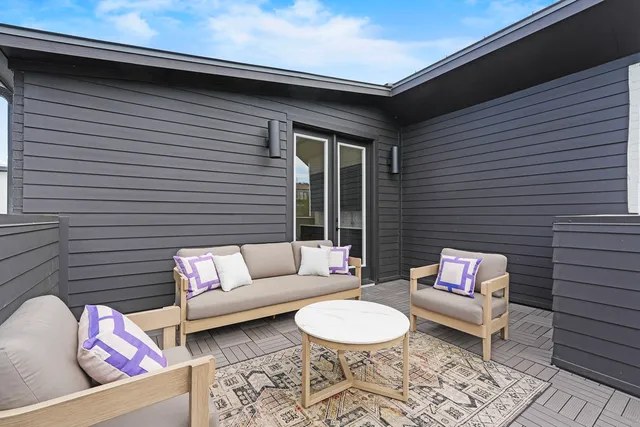 a building outdoor space with patio furniture