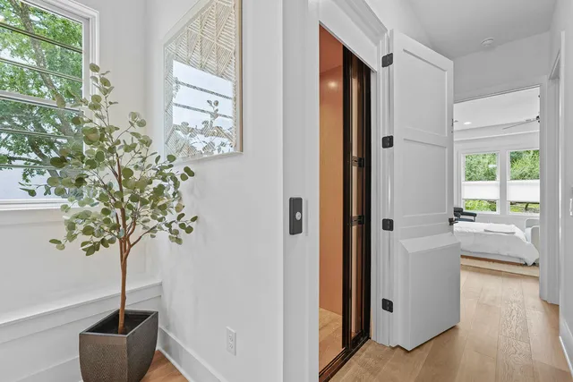 a view of entryway with wooden floor
