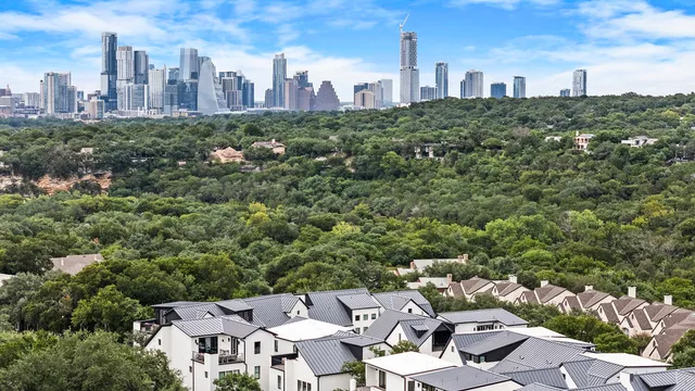 a view of a city with tall buildings