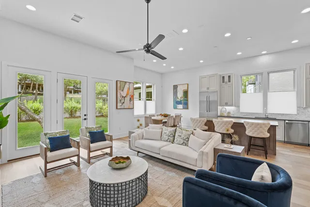 a large kitchen with granite countertop lots of counter space and breakfast area