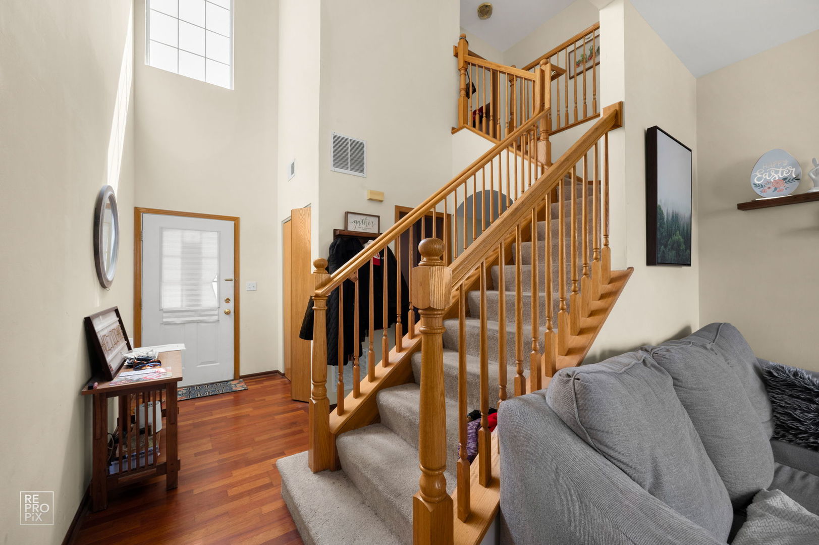 1827 Golden Gate Lane Naperville, IL 60563 - Photo 2 of 13 a view of entryway and hall with wooden floor