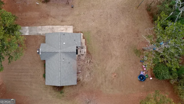 an aerial view of residential house with outdoor space