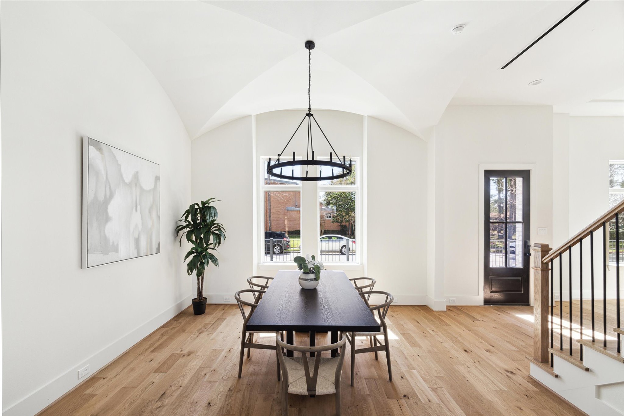 5309 Lambeth Riverside Drive Houston, TX 77091 - Photo 10 of 29 a view of a dining room with furniture window and wooden floor