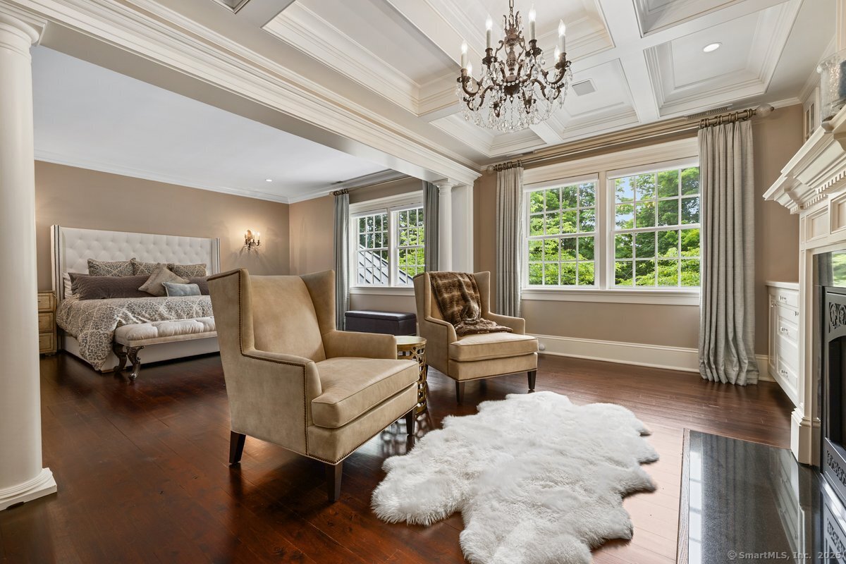 174 Branchville Road Ridgefield, CT 06877 - Photo 17 of 40 a living room with furniture and a large window