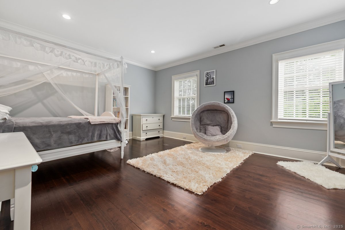174 Branchville Road Ridgefield, CT 06877 - Photo 21 of 40 a living room with furniture and a large window