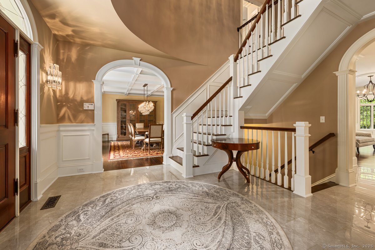 174 Branchville Road Ridgefield, CT 06877 - Photo 3 of 40 a view of a livingroom with wooden floor and furniture