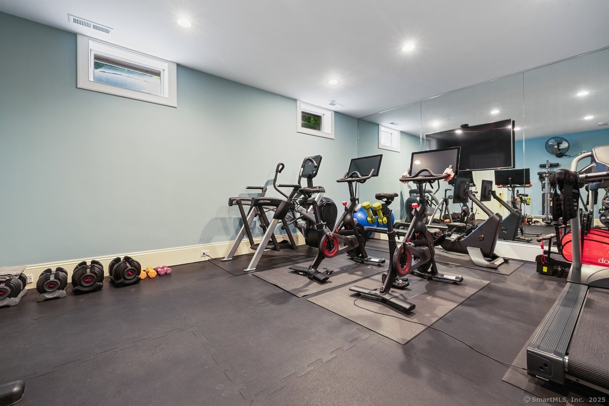 174 Branchville Road Ridgefield, CT 06877 - Photo 31 of 40 a view of a room with gym equipment