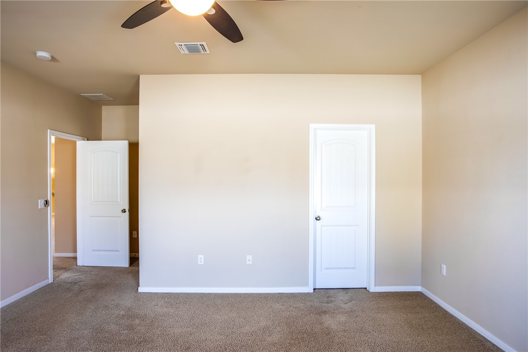 607 Brashear Lane Cedar Park, TX 78613 - Photo 17 of 28 an empty room with closet and window