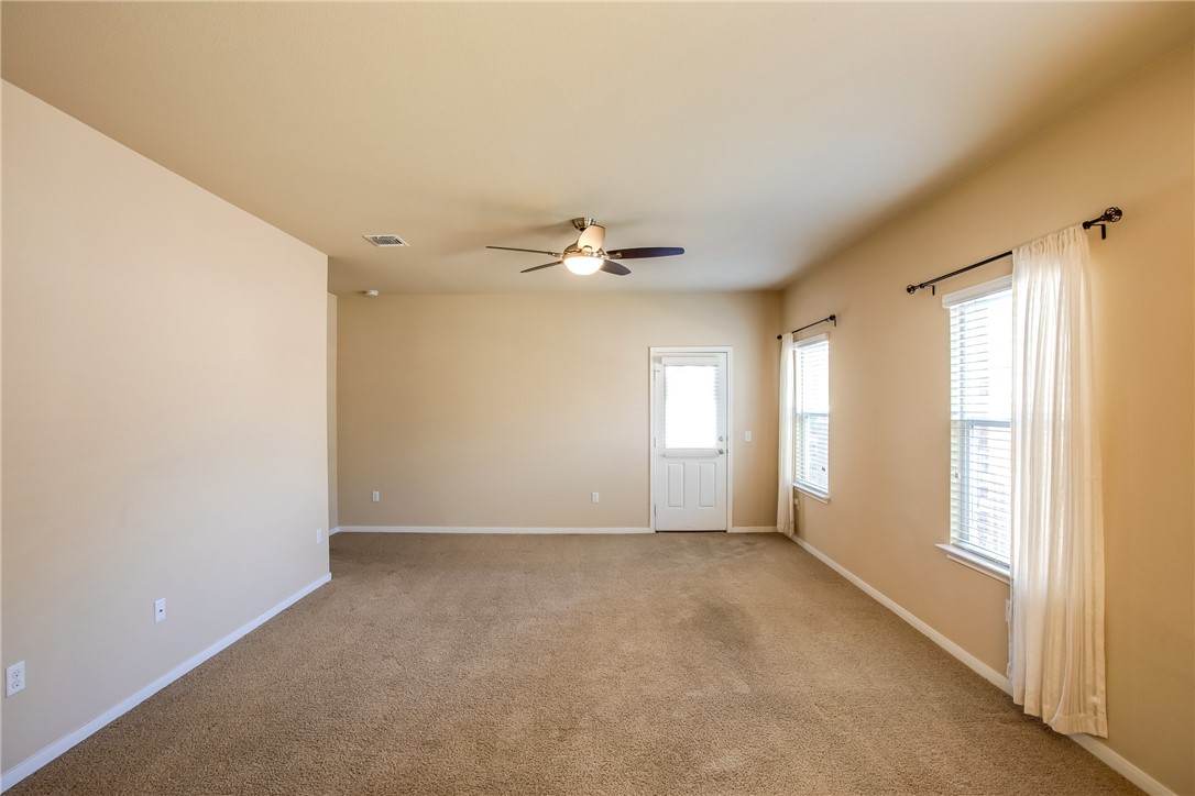 607 Brashear Lane Cedar Park, TX 78613 - Photo 6 of 28 a view of an empty room with a window