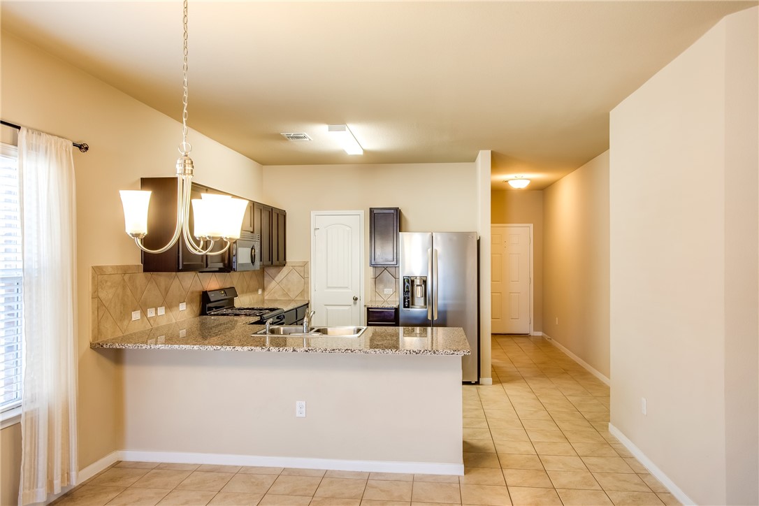 607 Brashear Lane Cedar Park, TX 78613 - Photo 10 of 28 a view of living room with granite countertop furniture