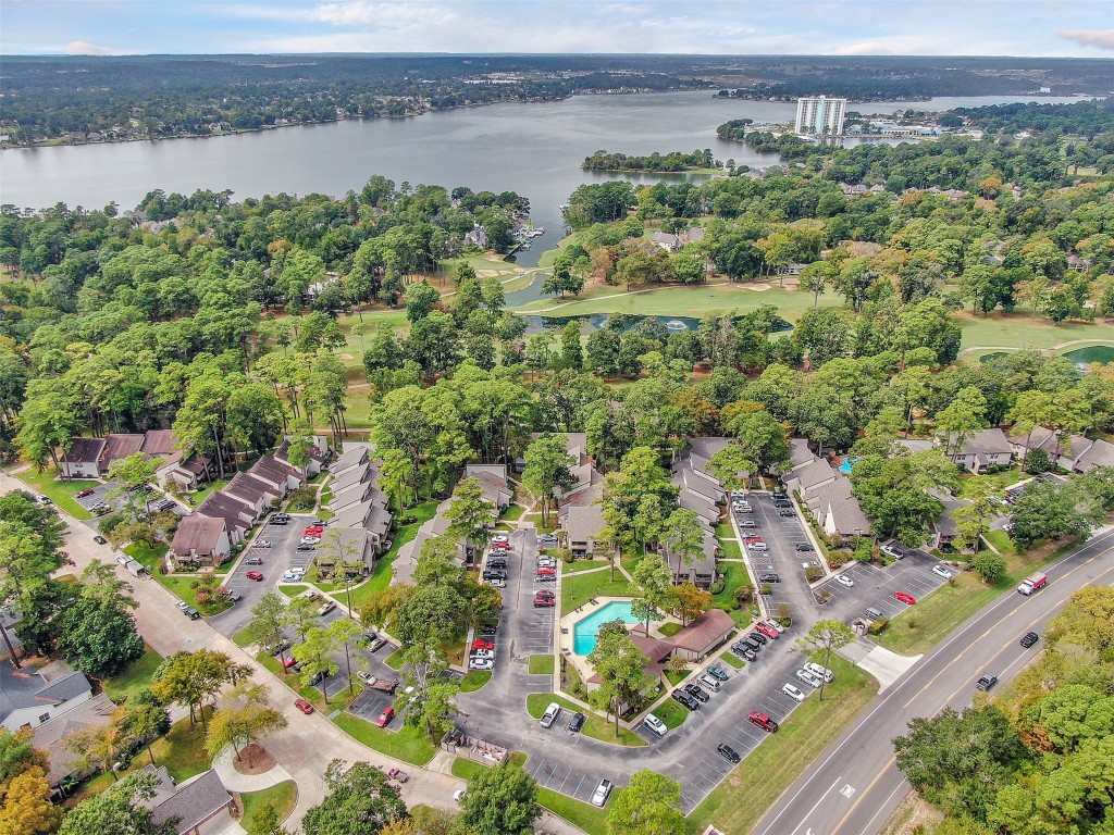 12900 Walden Road, Unit 620 Montgomery, TX 77356 - Photo 20 of 21 a view of a lake with a city view