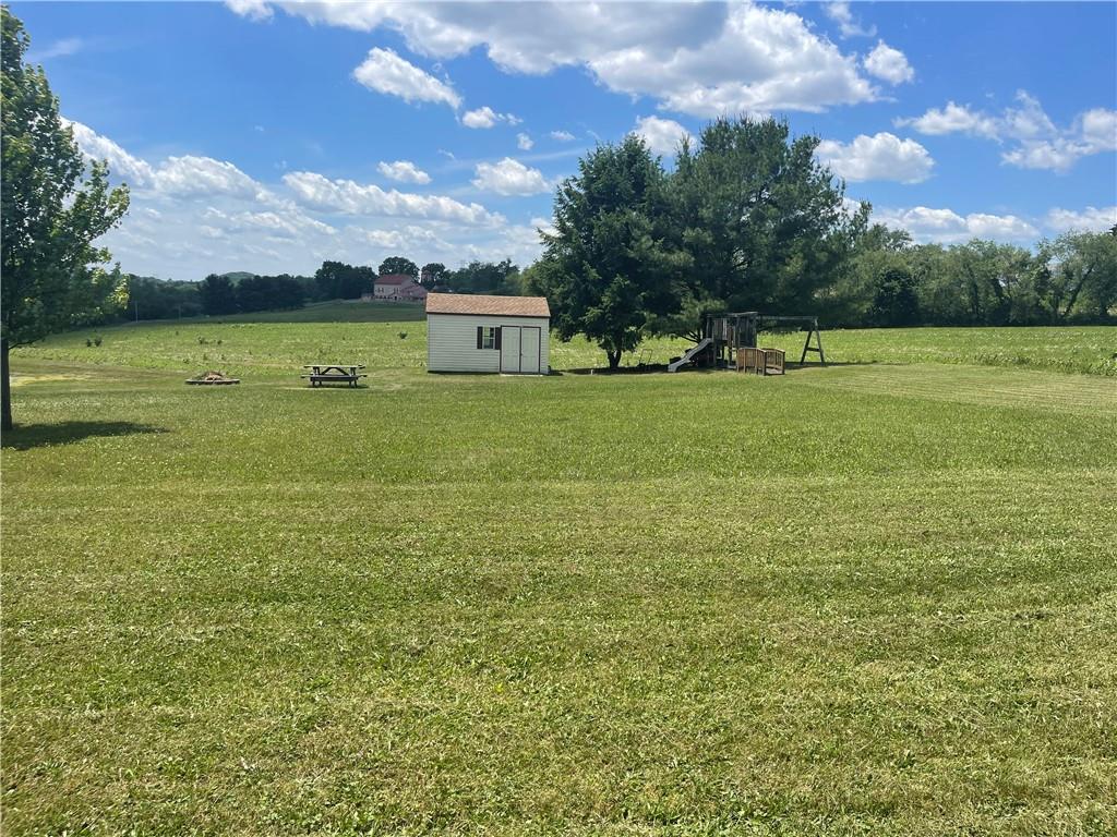 118 Burtner Road Butler, PA 16002 - Photo 5 of 22 a view of a green field with house in the background