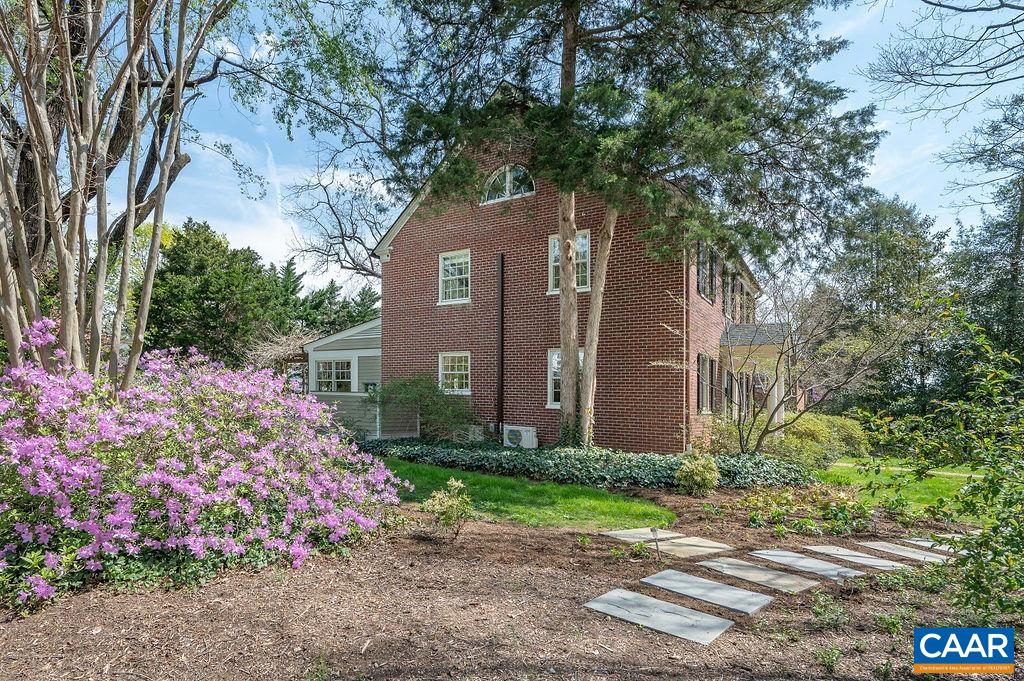 1935 Thomson Road Charlottesville, VA 22903 - Photo 54 of 60 a front view of a house with a yard and fountain
