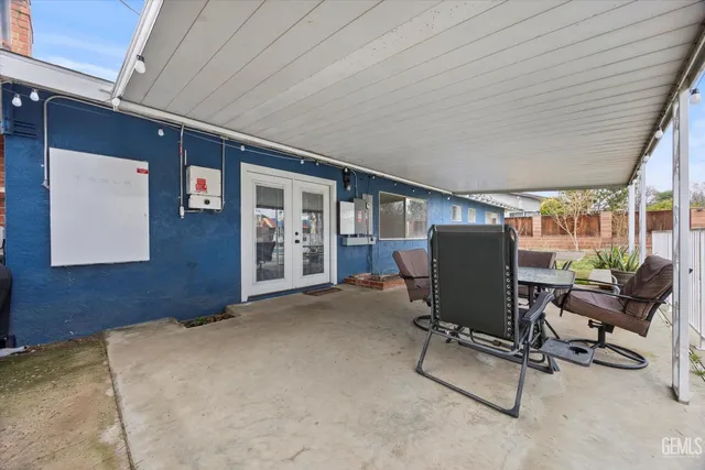 a view of workspace with furniture and windows