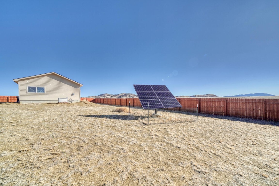 608 Rio Blanco Road Hartsel, CO 80449 - Photo 21 of 26 a view of a house with a yard