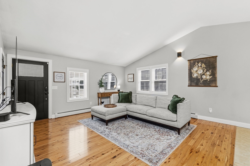 58 Bowler Street Fall River, MA 02723 - Photo 3 of 32 a living room with furniture and a rug